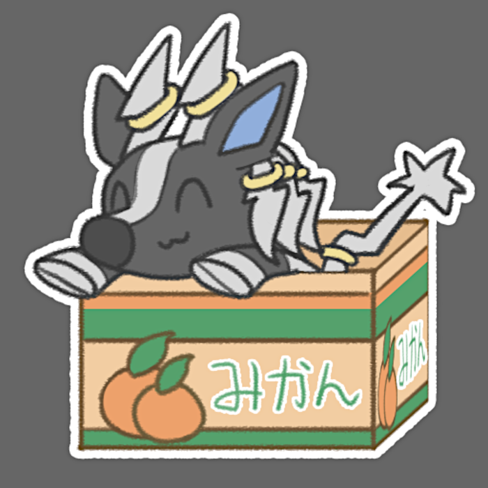 Ruzeth sitting in an orange box.
